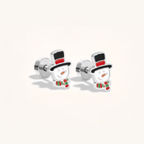Pair of silver snowman earrings on a light background.