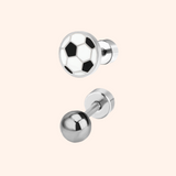 Silver earrings with soccer ball and plain ball design on a pink background