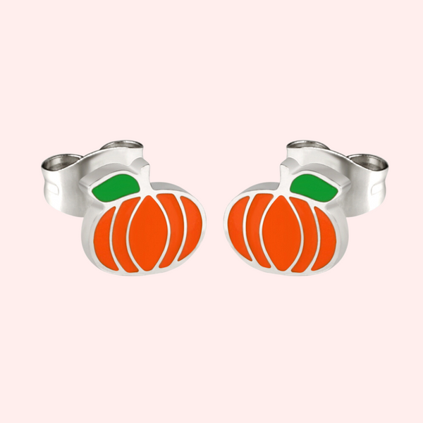 A pair of silver hypoallergenic earrings designed to resemble pumpkins with orange and green details.