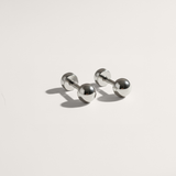 Ball hypoallergenic flat back stud earring in silver on white background
