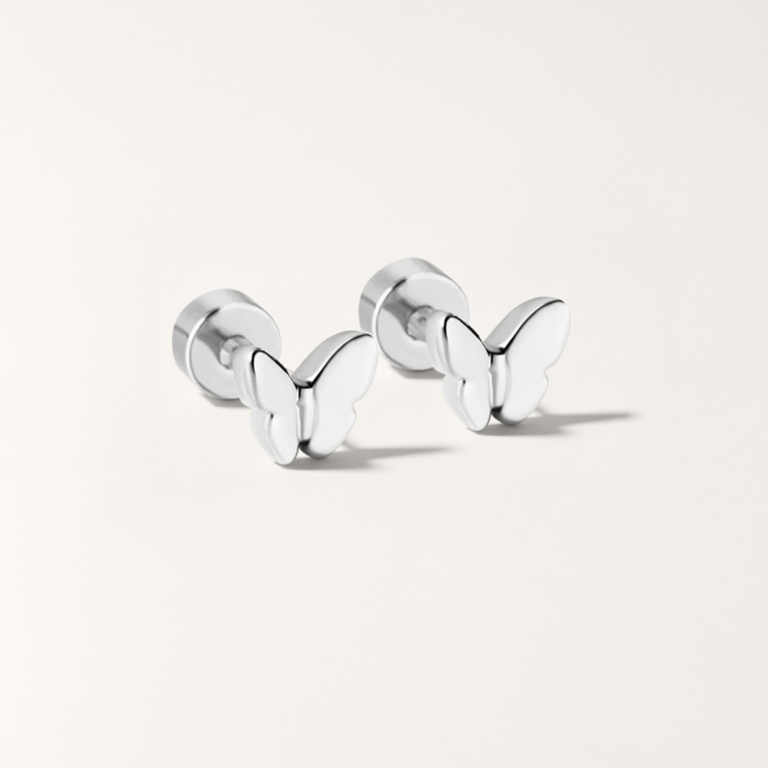 Butterfly hypoallergenic flat back stud earring in silver on white background