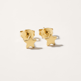 Mini star hypoallergenic earrings in gold on white background
