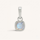 Silver pendant with a silver moonstone on a white background